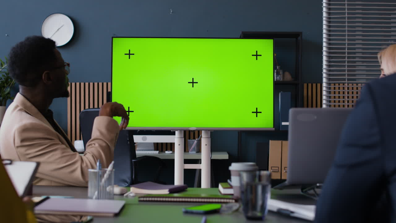 Business Meeting in Conference Room with Green Screen