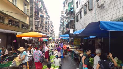 local traditional busy street food market in myanmar