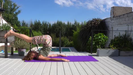 young caucasian woman during her morning yoga practice