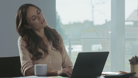 business woman trying to relax. tired woman relaxing at remote workplace.