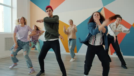 teenagers dancing in dance studio