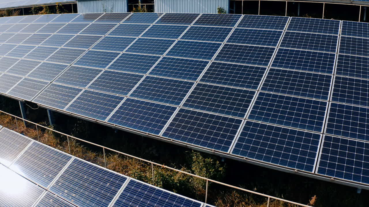 Alternative environmental green solar energy technology. Electrical industrial solar panels fields.