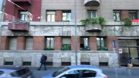 a street view of buildings in milan