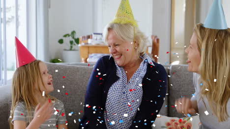 celebrating birthday on couch, family enjoying confetti animation