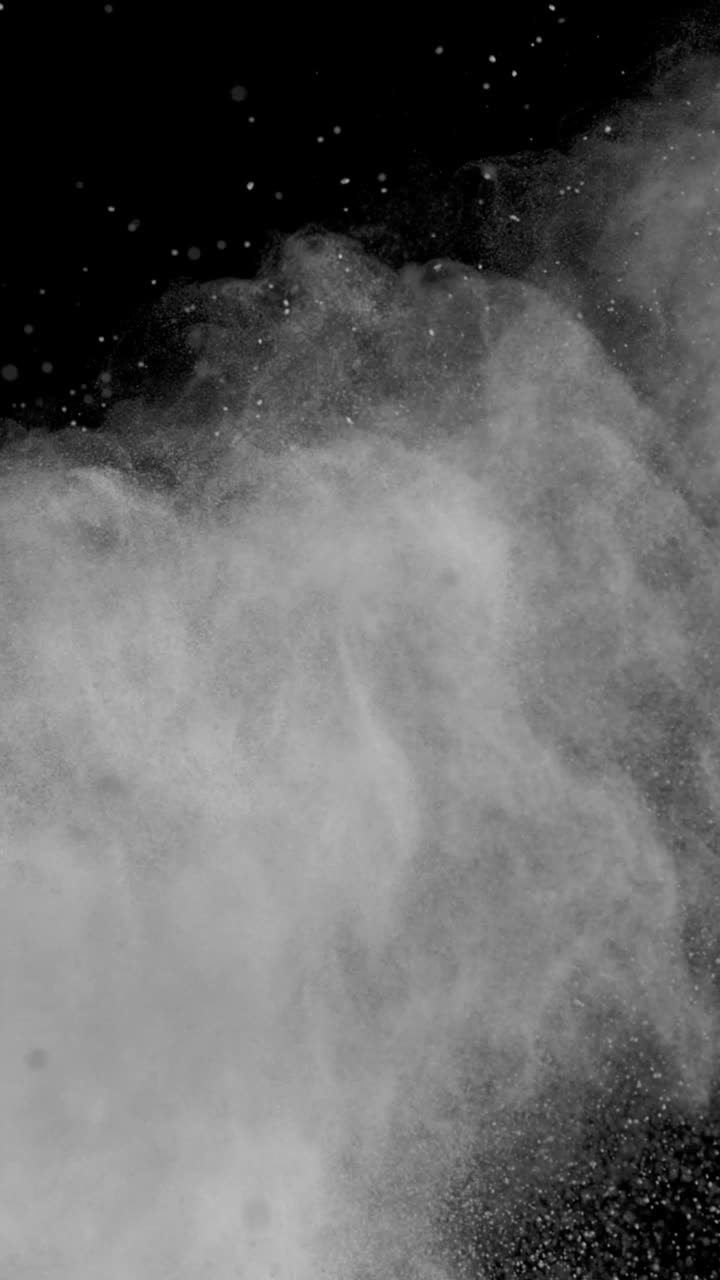 Super Slow Motion Shot of White Color Powder Explosion at 1000Fps Vertical View