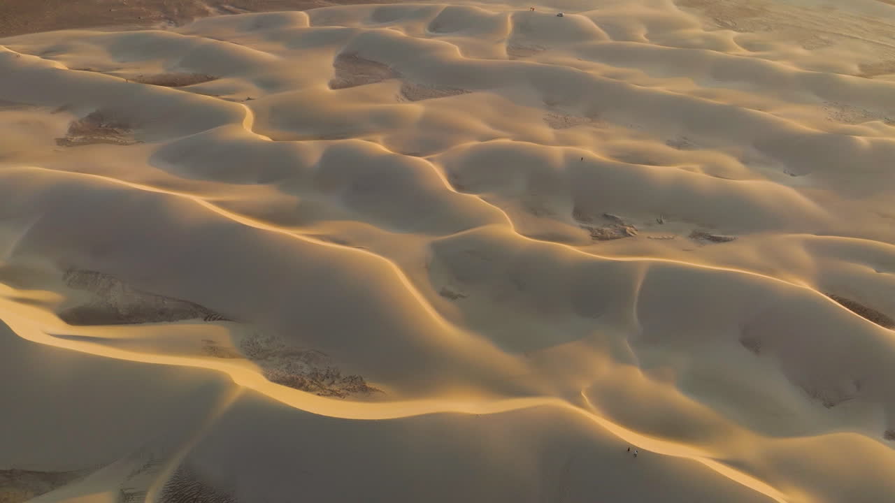 Sunset Illuminated Zahek Sand Dunes On The South Coast Of The Island Of Socotra In Yemen. Aerial Close-up Shot