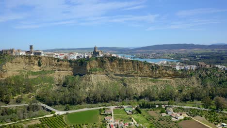 agricultural fields near cliff and town