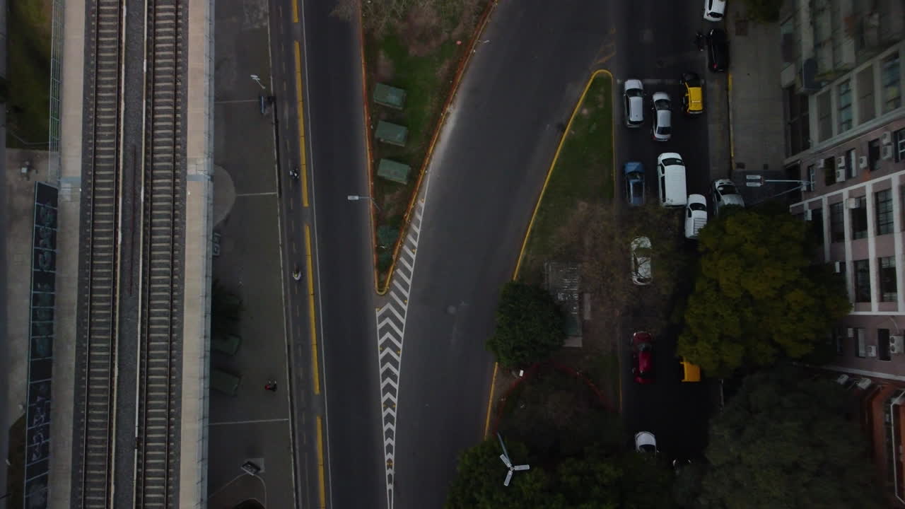 Road junction in Buenos Aires, near railway tracks, road markings, traffic