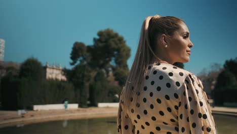 stylish young woman looking away in the park.