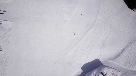 Aerial-of-ski-resort-at-sun-mountains-with-pine-forest