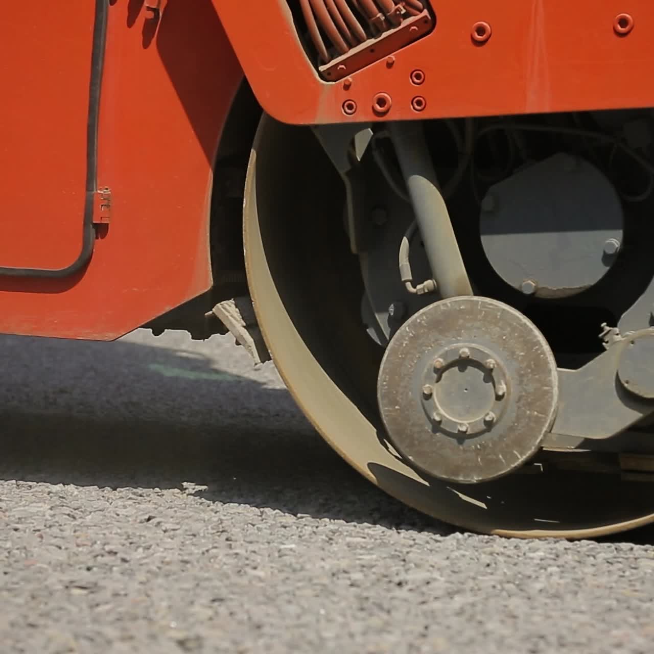 Road Roller Working On A Gravel
