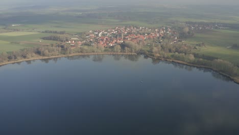 Drone-Aerial-of-the-Lake-Seeburg-Seeburger-See-on-a-beautiful-sunday-morning-in-the-Harz-national-Park-near-Göttingen-in-central-germany