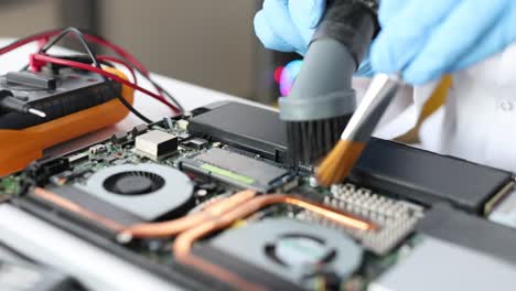 cleaning the internal components of a laptop