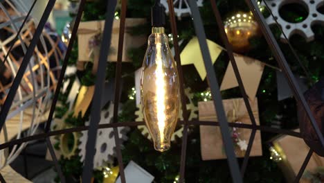 a spiral diode lamp in a bulb is loose on the wire. christmas mood and atmosphere