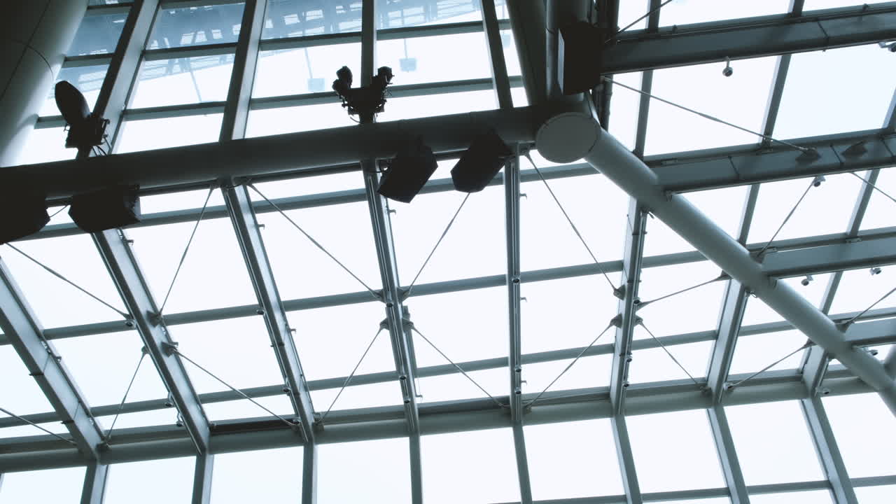 Modern transparent roof and metal ceiling beams