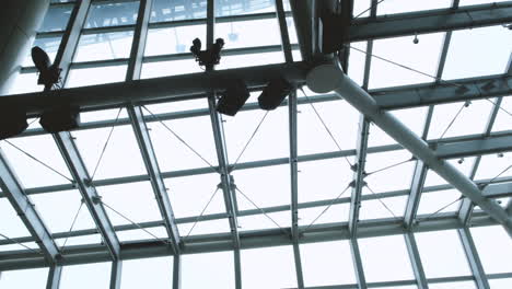 Modern-transparent-roof-and-metal-ceiling-beams