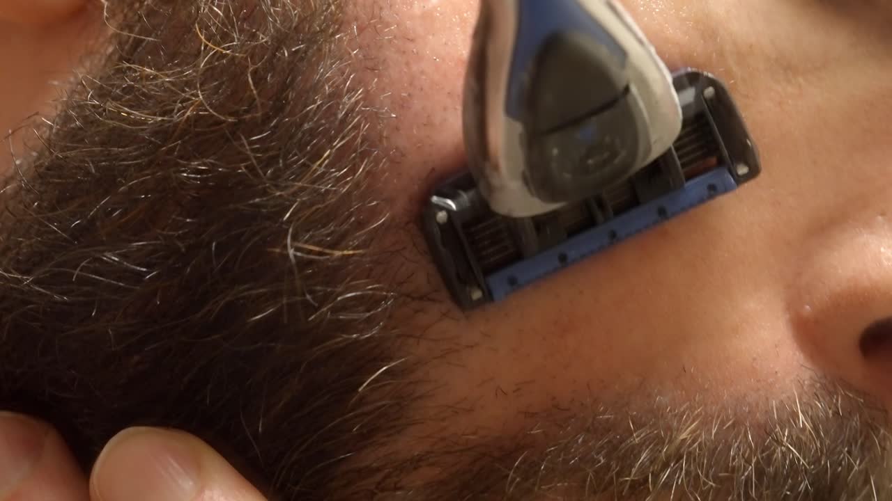 Man Getting Face Shave with Blade Razor – 120fps