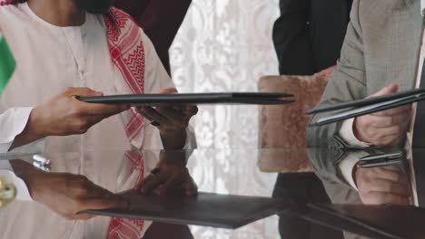 diplomats from different countries signing contract