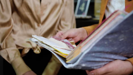 woman hands touching fabric pieces