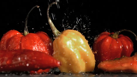 raindrops falling in super slow motion on vegetables