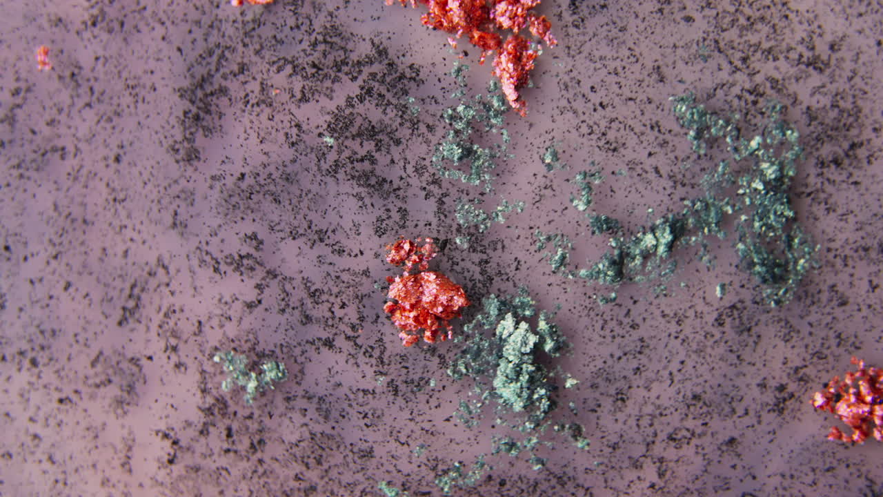 Close-up of colourful eyeshadow pigments