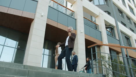 man dancing on city stairs