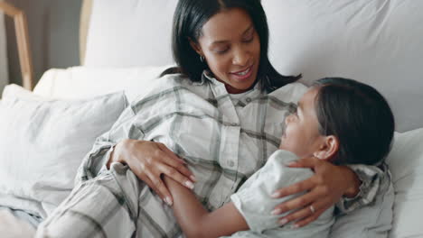 Bedroom,-hug-and-mother-with-girl