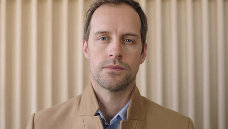 close-up-portrait-of-attractive-casual-businessman-looking-serious-intense-at-camera-focused-male-entrepreneur