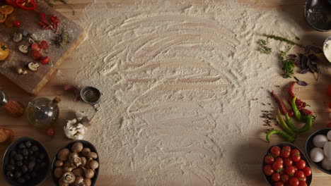 hot pizza on kitchen table board. chef presenting italian food in restaurant.