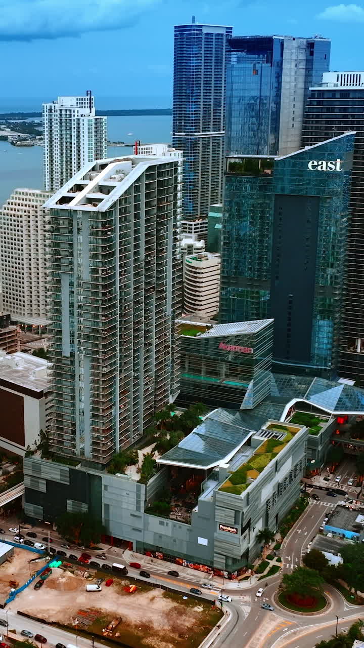 Modern high-rise architecture in Miami, Florida, USA. Stunning view of the buildings in downtown from top. Vertical video