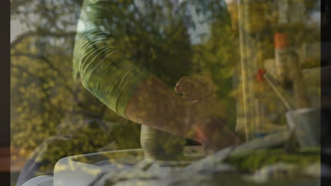 shaping clay on pottery wheel, person creating art in forest animation backdrop