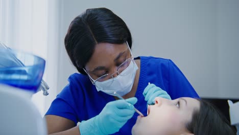 dentist examining a patient's teeth