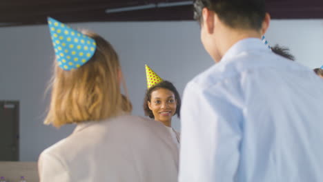 Happy-Multiethnic-Colleagues-Toasting-With-Champagne-And-Wine-And-Drinking-At-The-Office-Party-1