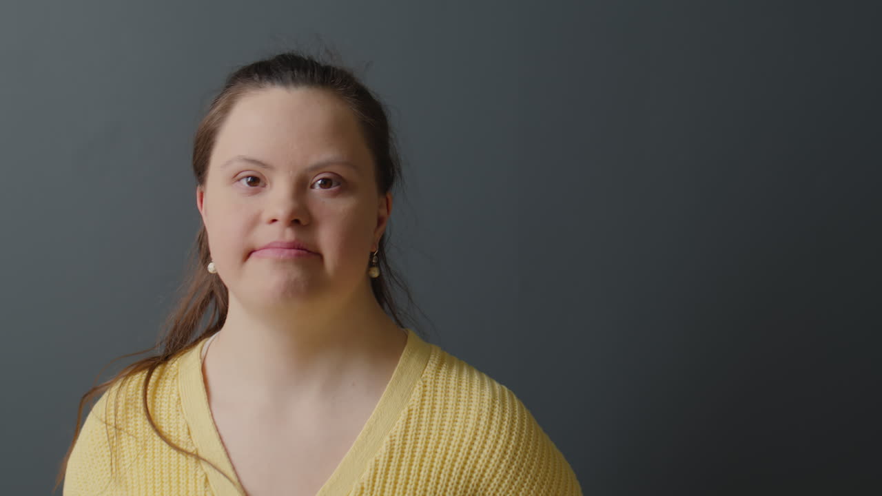 Portrait of Young Woman with Down Syndrome
