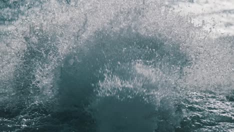 splashing water of lago argentino in patagonia, argentina