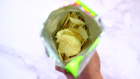 open bag of potato chips