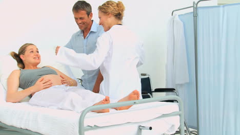 cute nurse visiting a pregnant woman