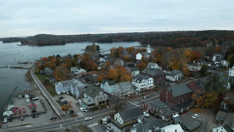 drone footage of wiscasset, maine downtown in autumn during sunset