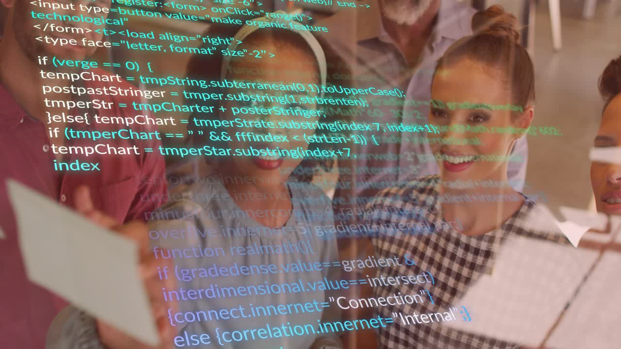 Woman explaining to team in office while lifting tablet showing scrolling JavaScript HTML code