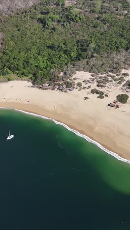 Cacaluta-beach-from-a-drone-in-vertical-mode