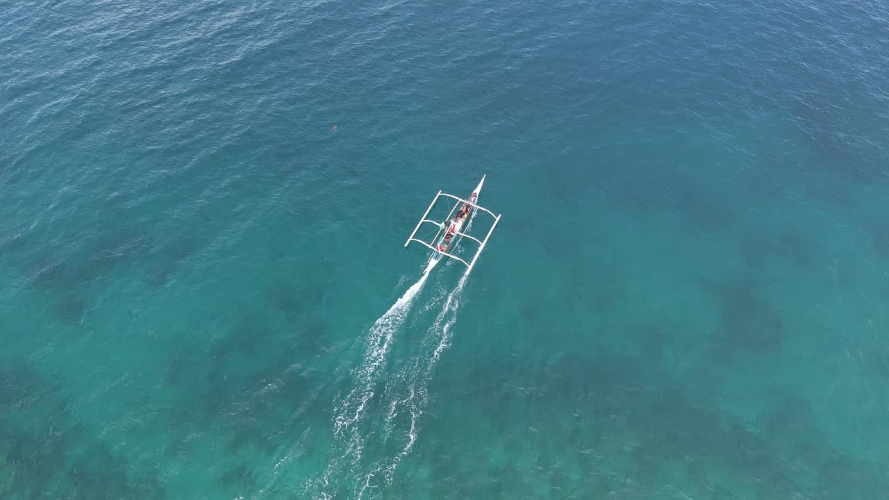 Aerial View of a Banca Boat Sailing in the Ocean
