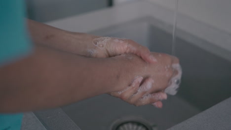 detail of hand washing by a healthcare professional 1