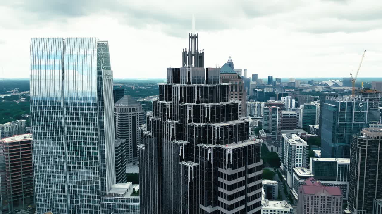 Promenade II, One Atlantic Center and Symphony Tower in Atlanta Midtown. CLoudy day in downtown with modern mirrored skyscrapers. Georgia, USA.