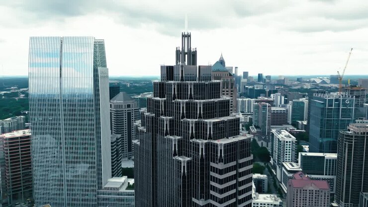 Promenade II, One Atlantic Center and Symphony Tower in Atlanta Midtown. CLoudy day in downtown with modern mirrored skyscrapers. Georgia, USA.