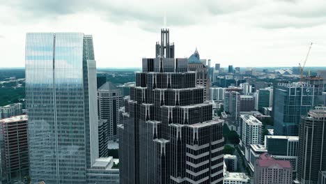 promenade ii, one atlantic center and symphony tower in atlanta midtown. cloudy day in downtown with modern mirrored skyscrapers. georgia, usa.