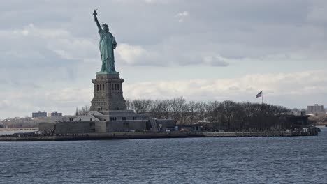 symbolic statue of liberty in new york harbor, new york, usa