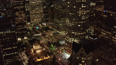 Los-Angeles,-California,-United-States-at-Night-with-City-lights-and-Skyscraper-Towers,-Aerial-Wide-View