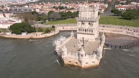 aerial view of belem tower on the bank of the tagus river in lisbon, portugal