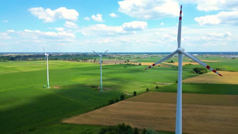 Aerial-view-of-powerful-Wind-turbine-farm-for-energy-production-on-beautiful-cloudy-sky-at-highland