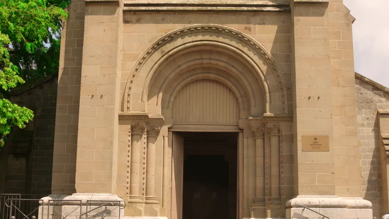 Discover the intricate architecture of the Saint Sernin church bell tower in Brive la Gaillarde, France. This captivating structure showcases detailed stonework and historic charm